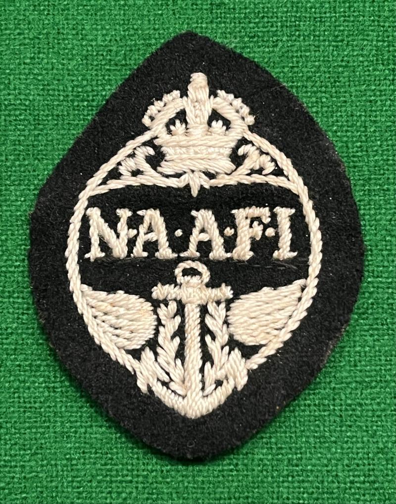 N.A.A.F.I. Cap badge.