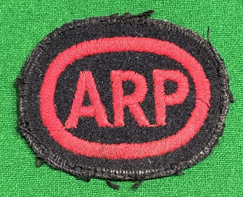 ARP breast badge.