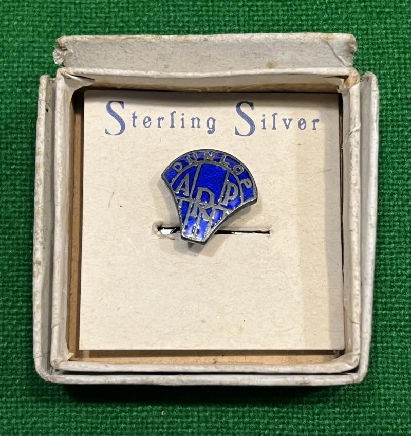 Boxed Dunlop ARP lapel badge.