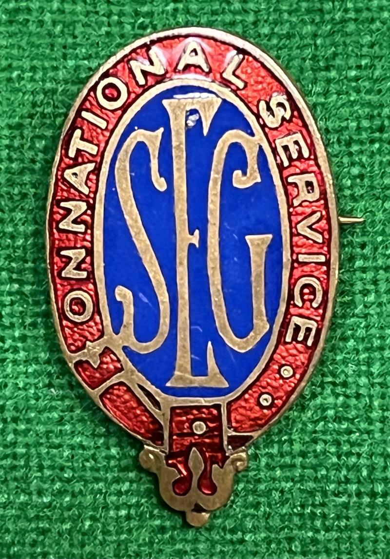 S.E.G. On National Service lapel badge.