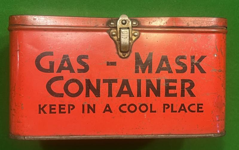 Biscuit tin Gas-mask case.
