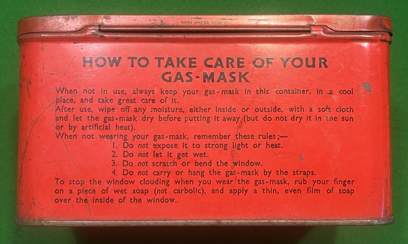Biscuit tin Gas-mask case.