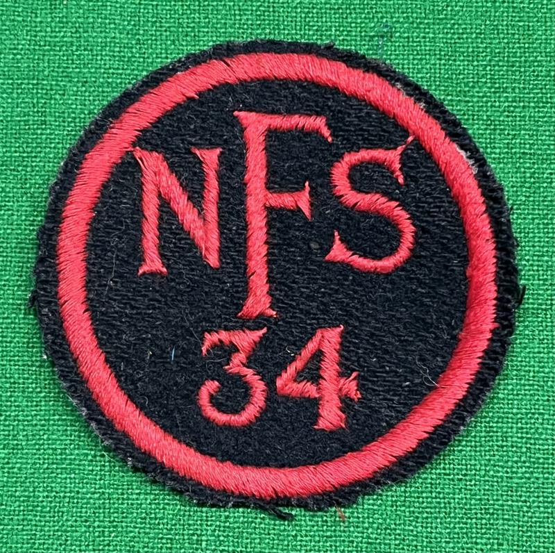 NFS 34 Breast badge.