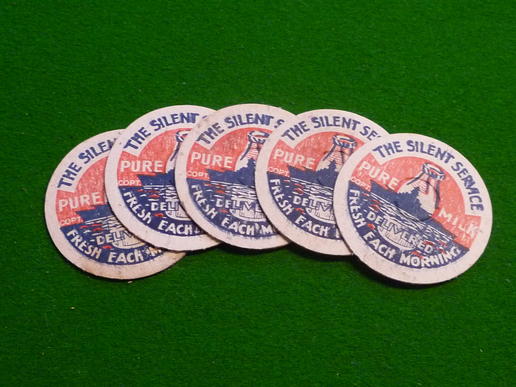 Wartime Milk Bottle Tops. - 'Silent Service' slogan.