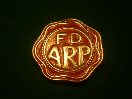 ' F.D. ' factory ARP badge.