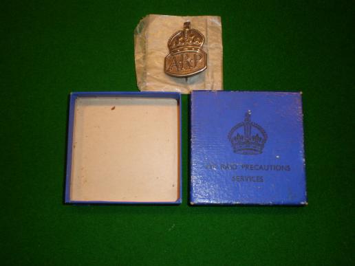 Boxed Silver ARP badge.