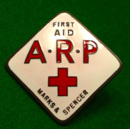 Marks & Spencer ARP First Aid badge.