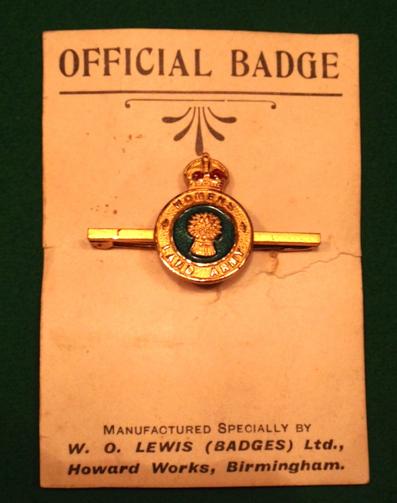 WLA gilt and enamel tie pin on original sales card.